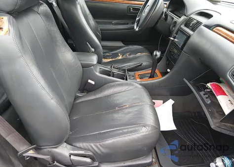 2002 Toyota Camry Solara Se/Sle z USA, uszkodzony, nr VIN 2T1FF28P42C598561